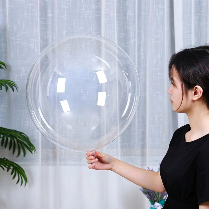 Clear bobo balloon giant sphere scale shown with model