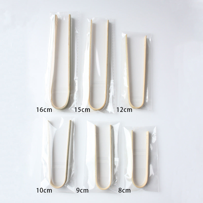 Bamboo food tong eight centimeter length beside steel ruler