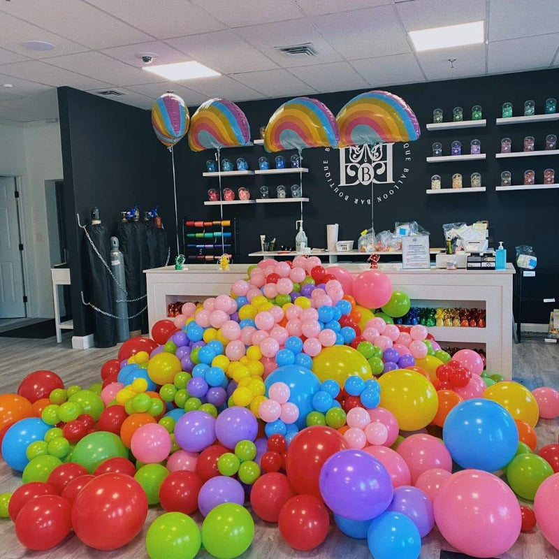Latex balloons bulk inflated filling party event venue floor