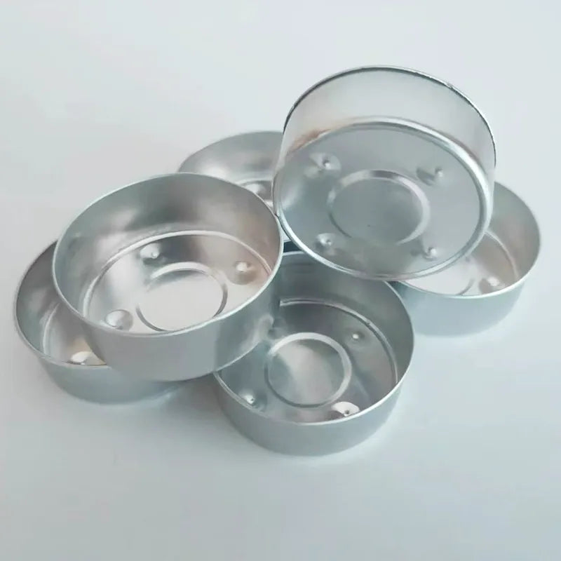 Aluminum tealight cups empty containers showing rolled rims and base