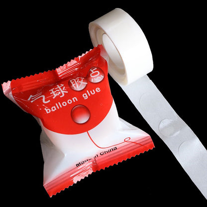 Balloon glue dots 100-count roll in red polybag packaging with Chinese labeling