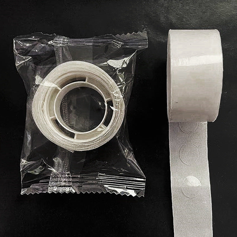 Balloon glue dots 100-count roll in clear transparent polybag packaging