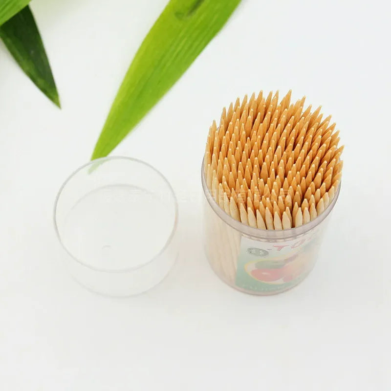Bottled bamboo toothpick open cylindrical container packed vertical tips
