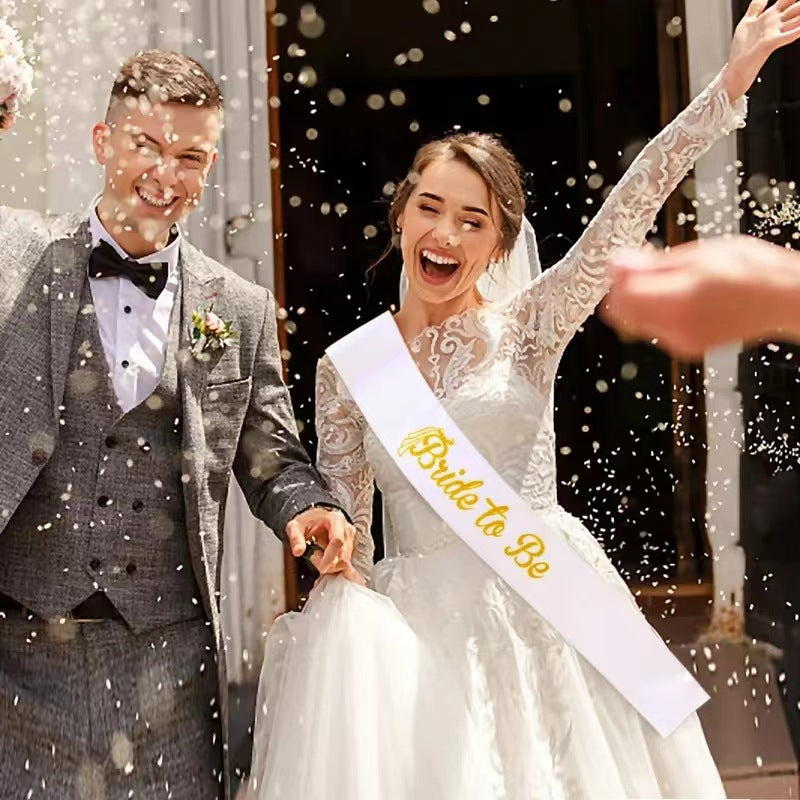Bride to be satin sash wedding couple celebration outdoors