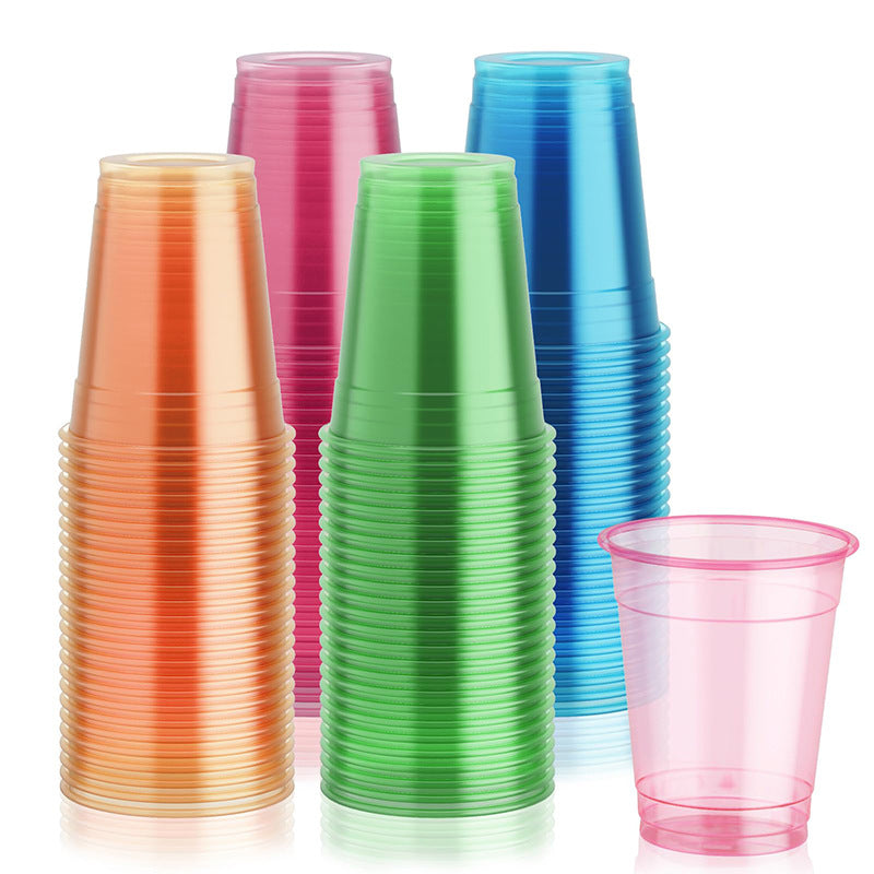 Clear PP plastic drinking cups stacked for party and catering use