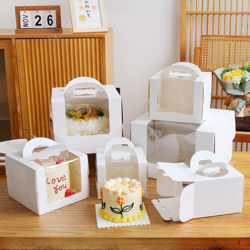 Wholesale clear window cake packaging boxes with handle - Assorted white cake box sizes tabletop display