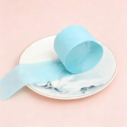 Crepe paper streamer Tiffany blue wound roll unrolled ribbon