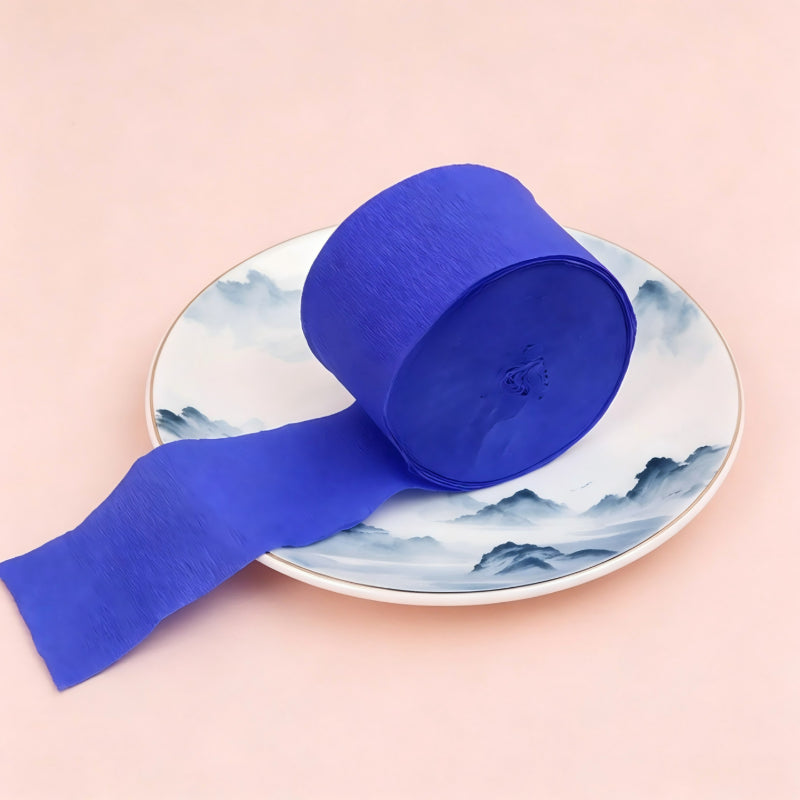 Crepe paper streamer royal blue compact roll extending strip