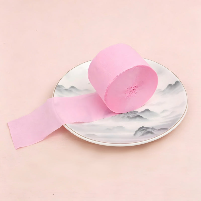 Crepe paper streamer pink wound roll unrolled ribbon