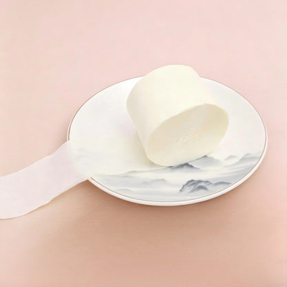 Crepe paper streamer cream white coiled roll extending ribbon
