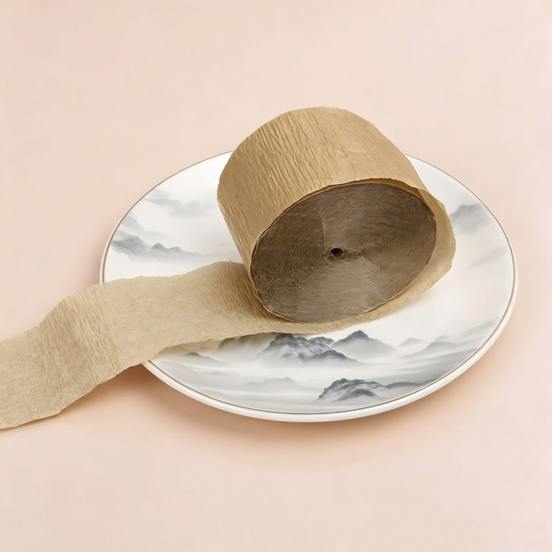 Crepe paper streamer metallic gold compact roll unrolled strip