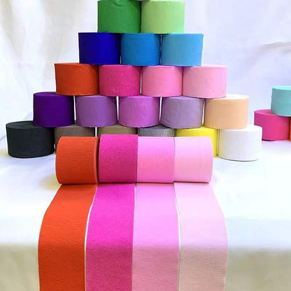 Crepe paper streamer pyramid stack assorted colorful party rolls