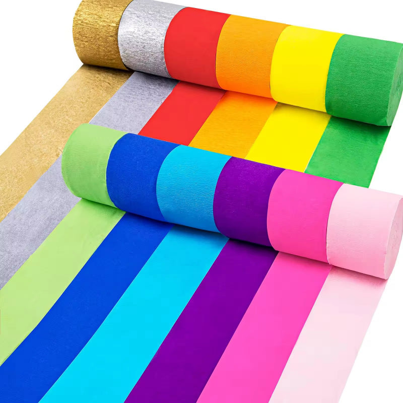 Crepe paper streamer multi-color rolls unrolled in parallel rows