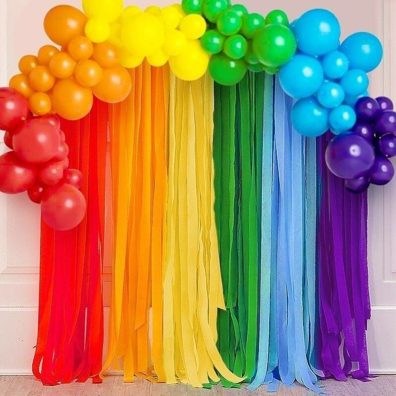 Crepe paper streamer colorful ribbon backdrop with balloon garland