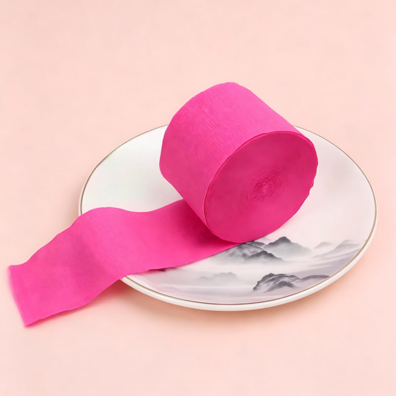 Crepe paper streamer rose red compact roll unrolled tail