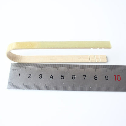 Bamboo food tong nine centimeter model beside steel ruler