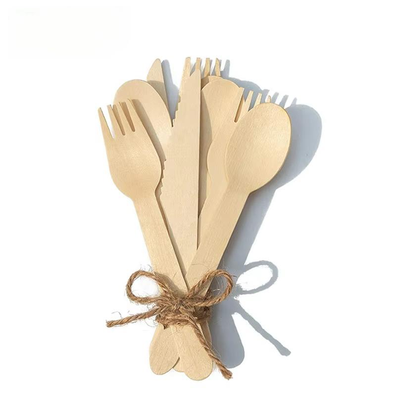 Assorted wooden spoons, forks, and knives shown together