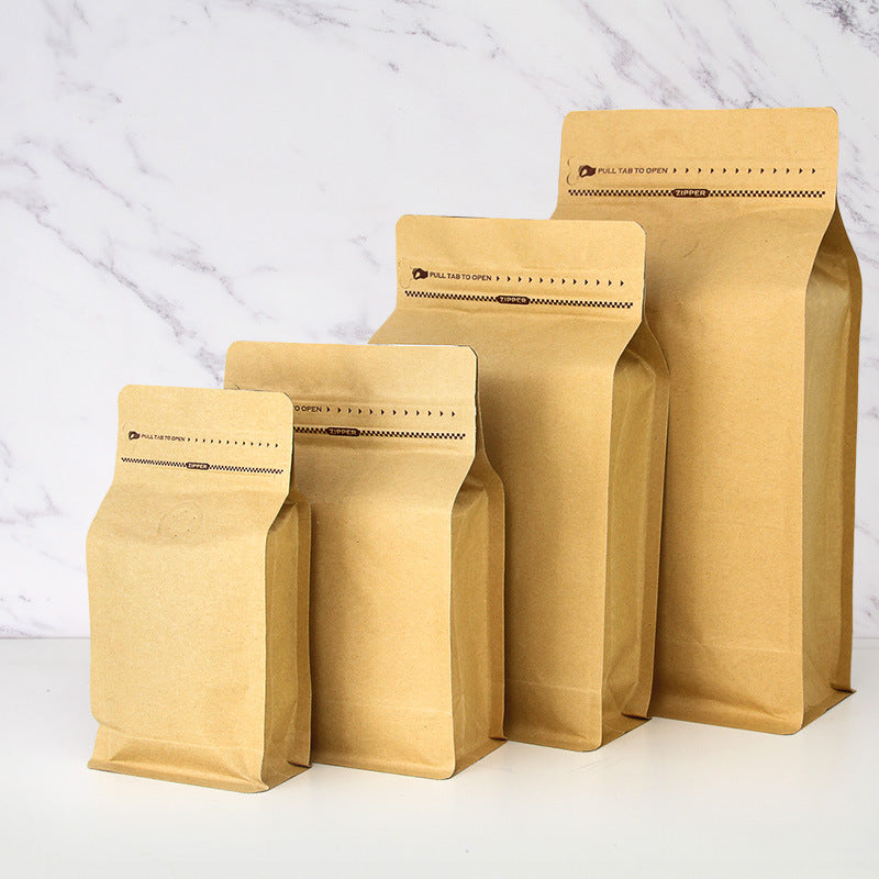 Coffee valve bag natural kraft four capacity graduating lineup showing pull tab zipper and degassing valve