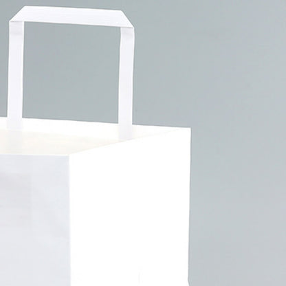 Flat handle kraft bag close-up detail of bleached white fold-over flat handle and top rim