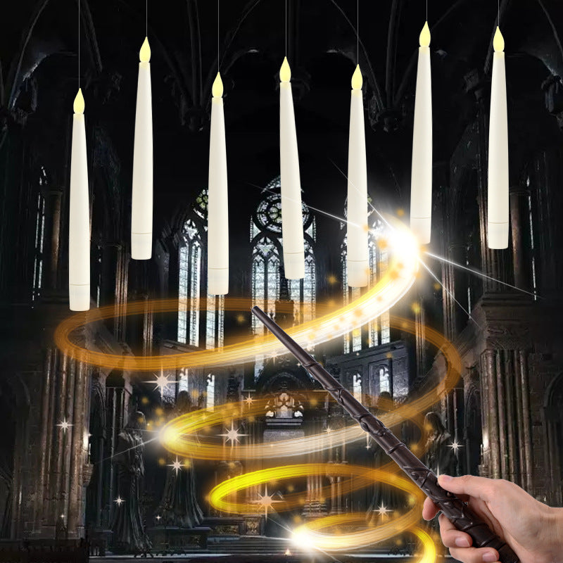 Floating LED taper candle ceiling suspension with magic wand remote operation
