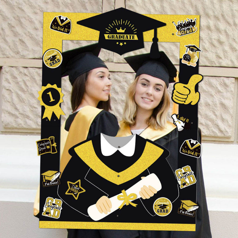 Graduation photo booth frame two graduates holding selfie prop setup