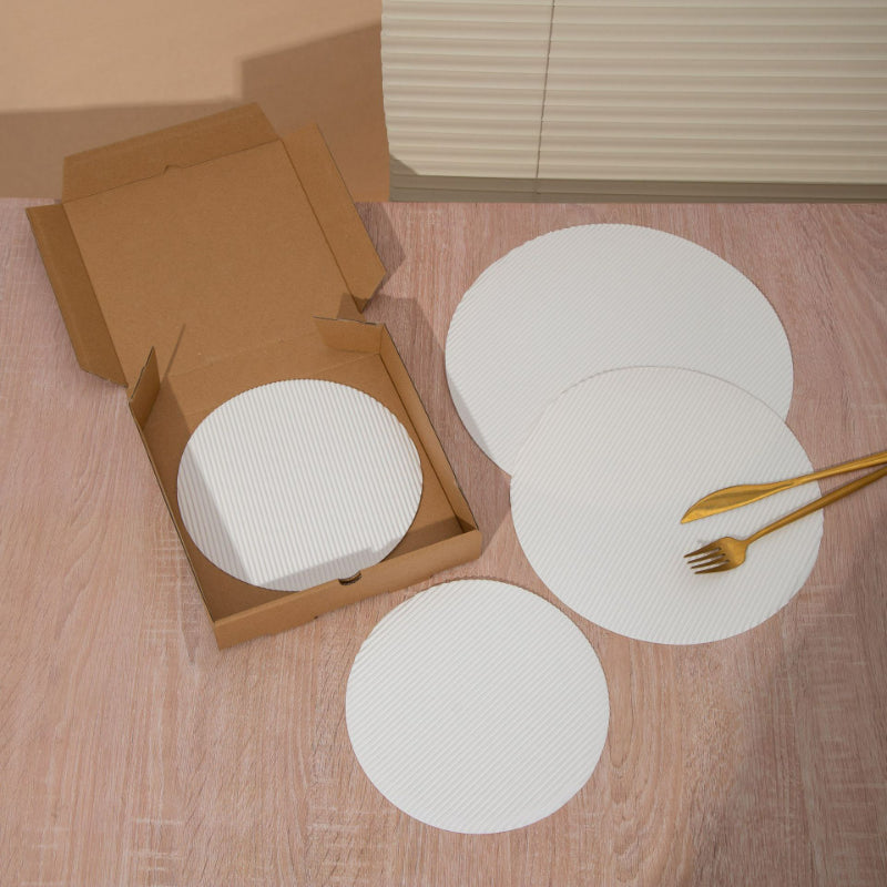 Fluted pizza liner multiple round diameter sizes displayed for size comparison