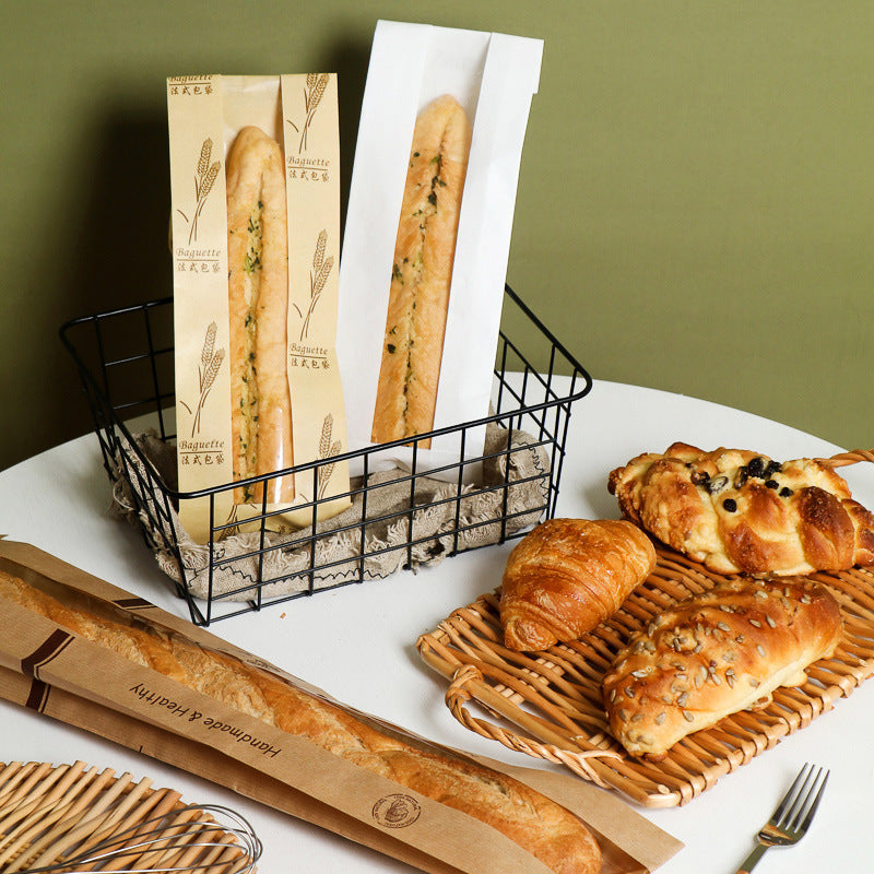 Kraft baguette bag short sleeves standing upright displaying wheat print and plain white