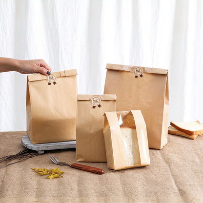 Kraft bread bag multi-size collection showing sealed backs with round stickers and front view