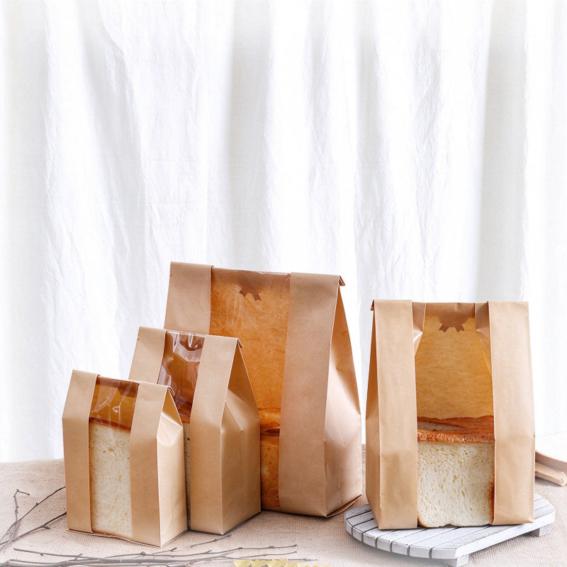 Kraft bread bag four commercial sizes 23cm to 35cm standing in a tiered row