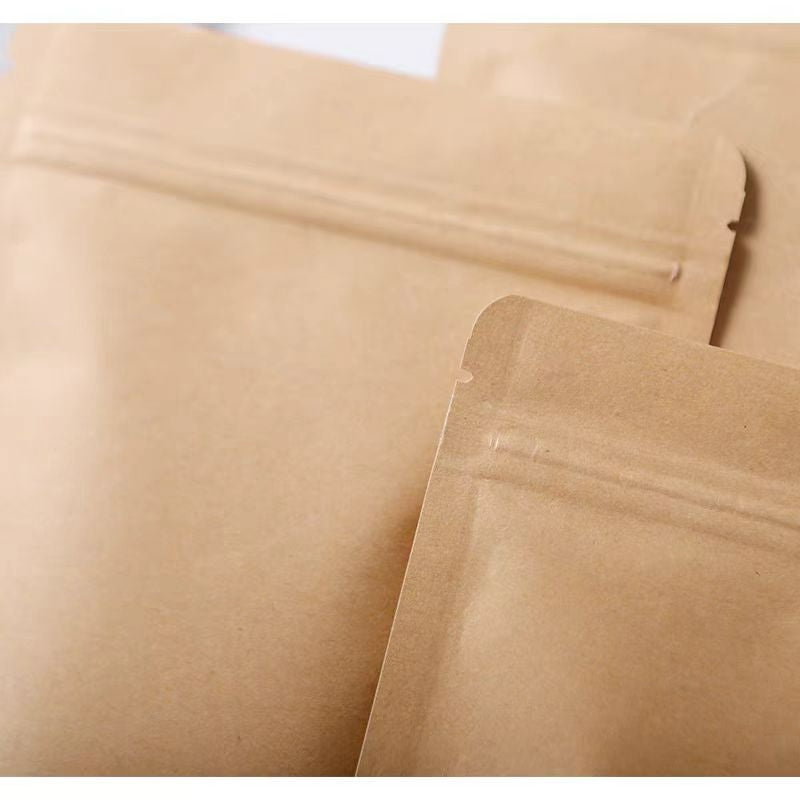 Foil-lined flat pouch close-up tear notch and heat-seal header