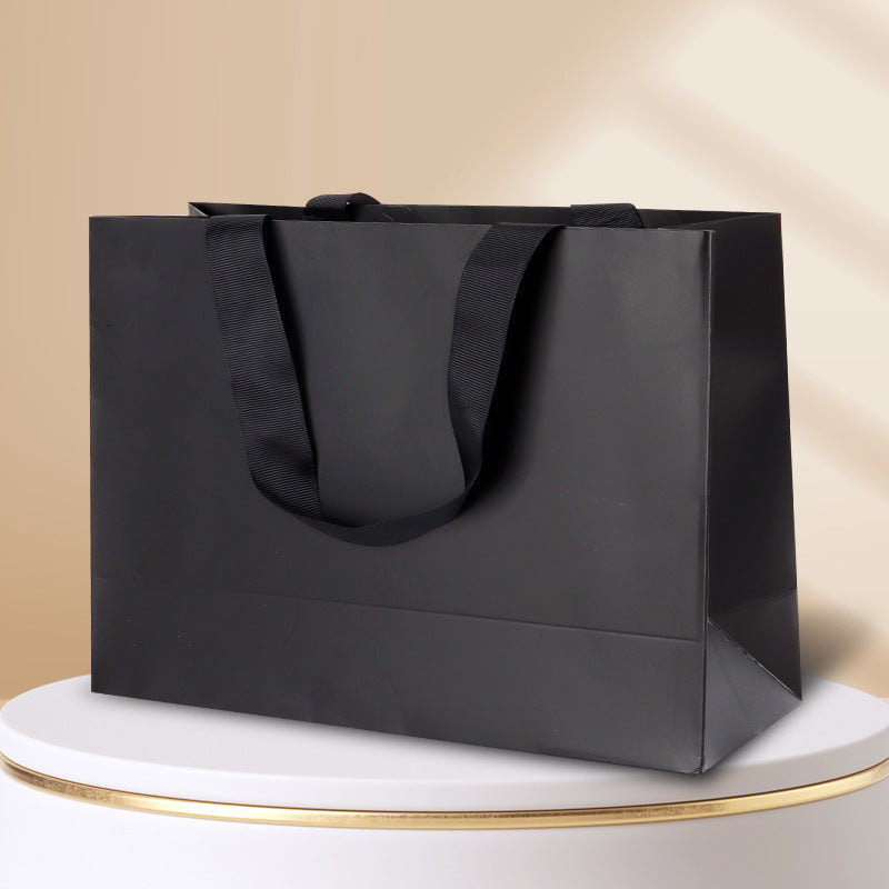 Kraft gift bag solid black horizontal landscape finish with matching black embedded ribbon handles