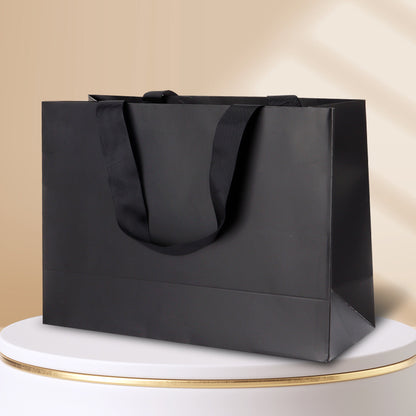 Kraft gift bag solid black horizontal landscape finish with matching black embedded ribbon handles