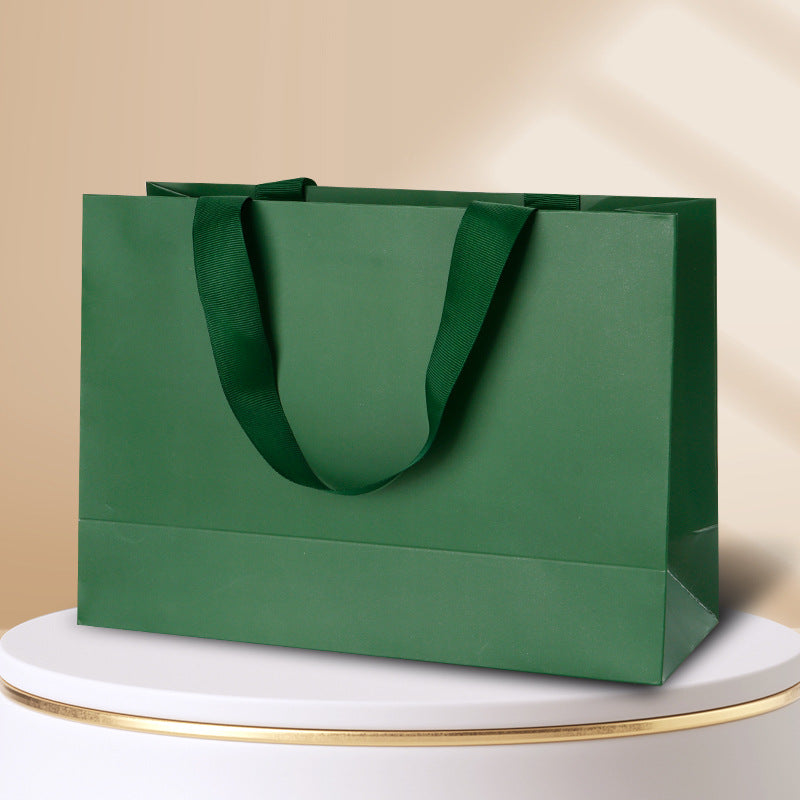 Kraft gift bag forest green horizontal landscape finish with matching wide embedded ribbon handles