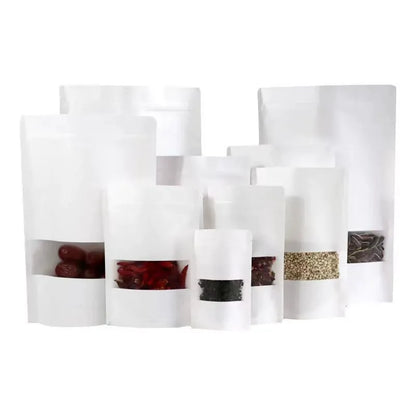 Kraft stand-up pouch bleached white multi-size lineup displaying transparent front windows and top zip seals
