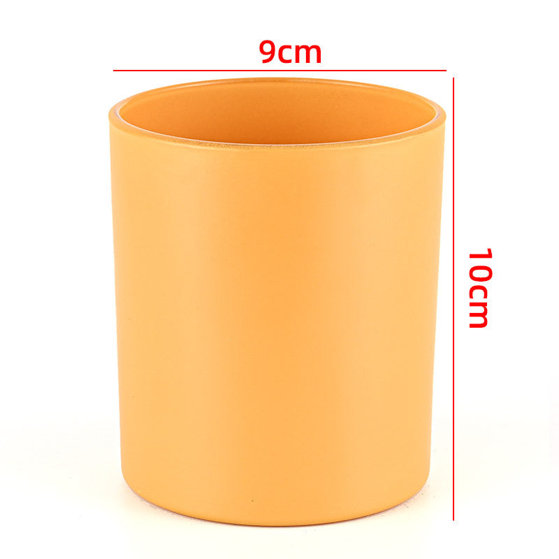 Glass candle vessel glossy orange yellow 430ml front view