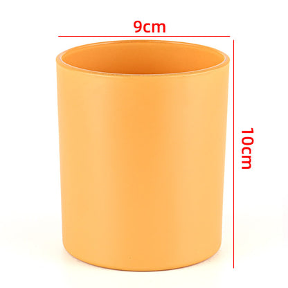 Glass candle vessel glossy orange yellow 430ml front view