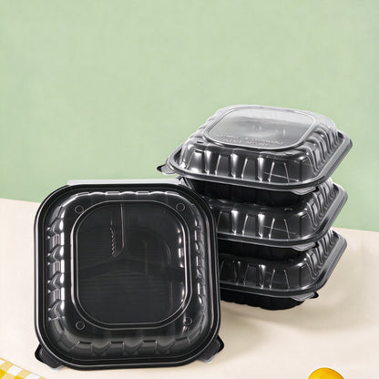 Hinged clamshell container stacked units beside open base showing nesting alignment
