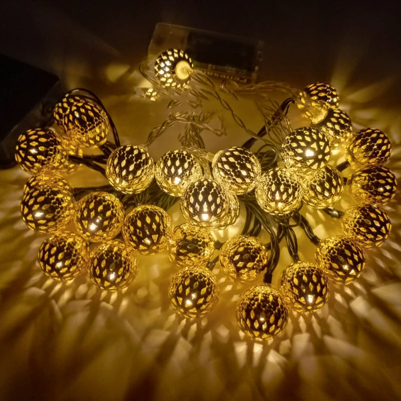 Moroccan metal globe string light coiled cluster warm white illumination
