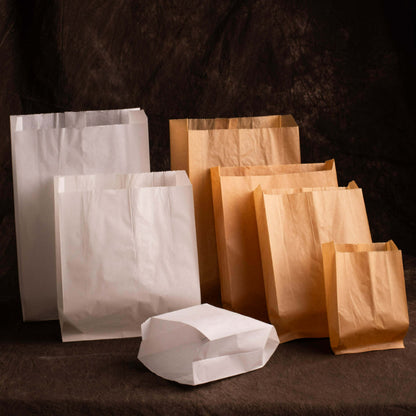 Pinch bottom kraft bag assorted brown and white stack