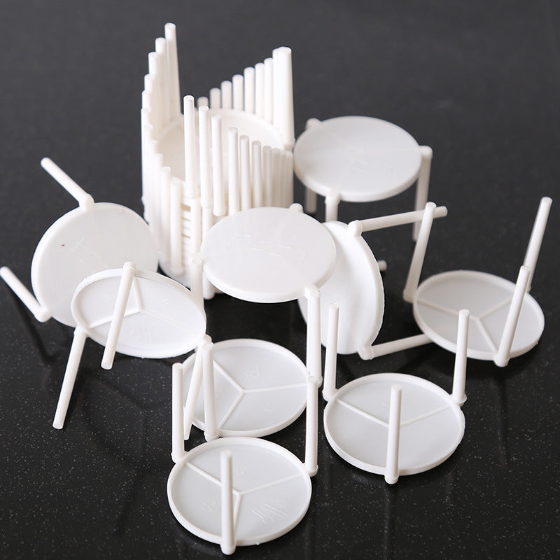 Pizza saver stand bulk cluster showing multiple scattered white units