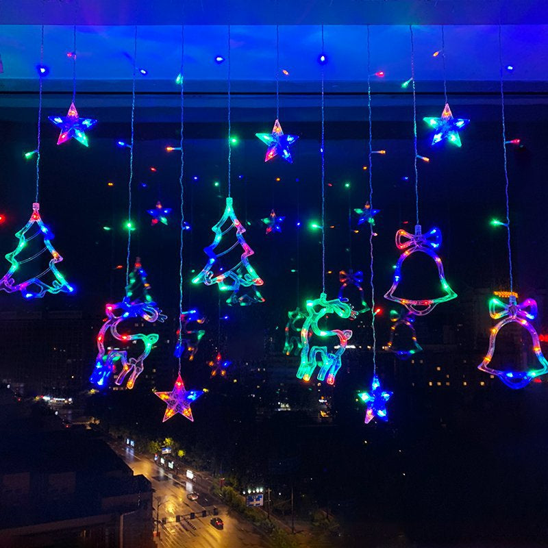Curtain string lights multicolor Christmas holiday festive trees and bells