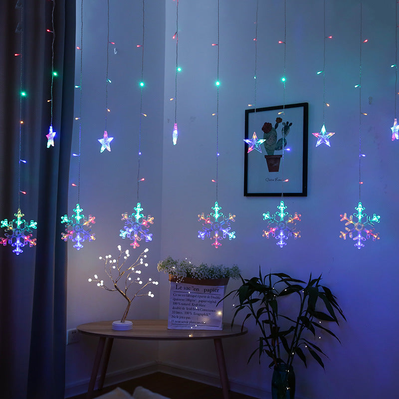 Curtain string lights vibrant multicolor snowflakes and star pendants hanging