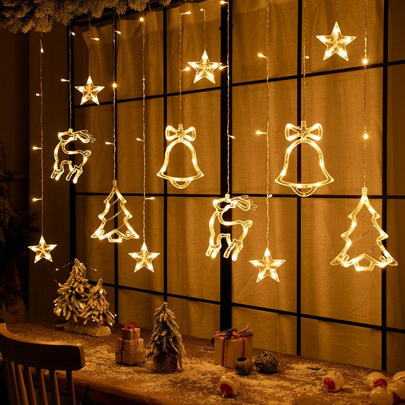 Curtain string lights warm white Christmas holiday trees and bells