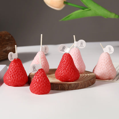 Wholesale strawberry novelty shaped party candles - Assorted sizes and colors display on wooden tray
