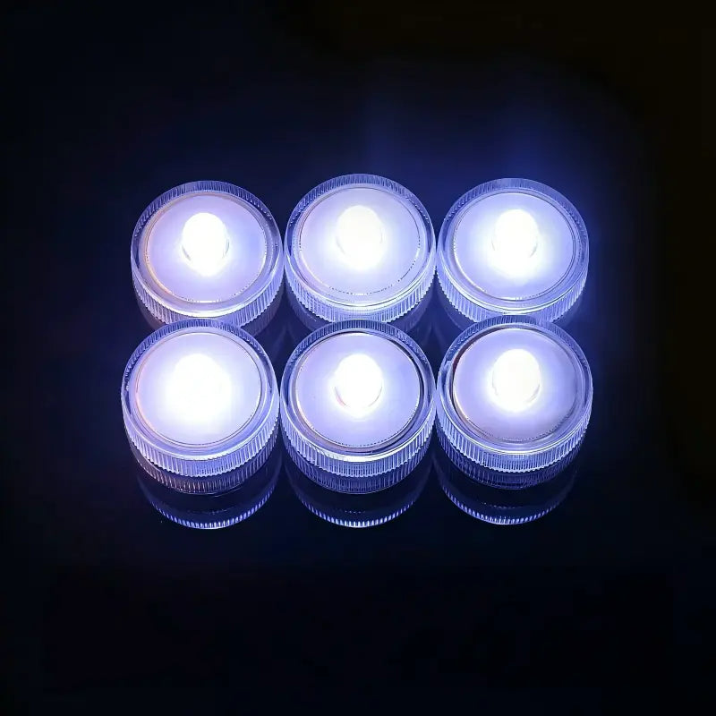 Submersible waterproof LED tea light cool white glowing units arranged in grid