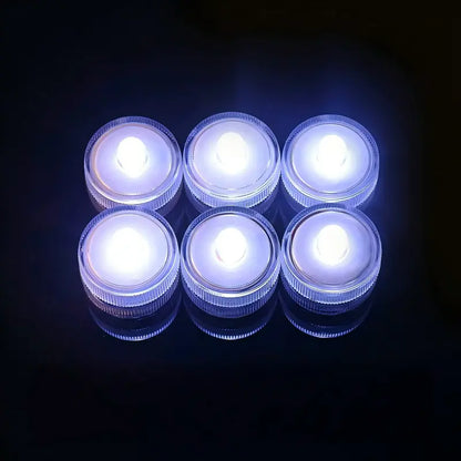 Submersible waterproof LED tea light cool white glowing units arranged in grid