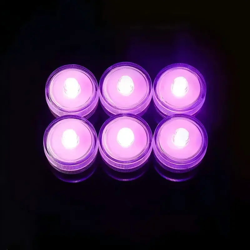 Submersible waterproof LED tea light pink glowing units arranged in grid