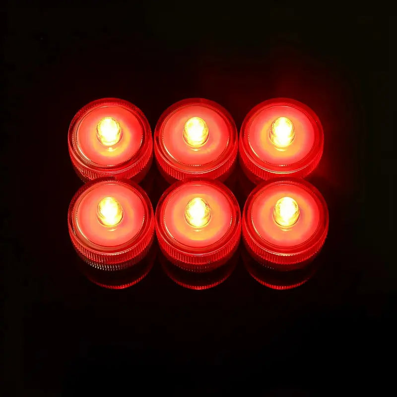 Submersible waterproof LED tea light red glowing units arranged in grid