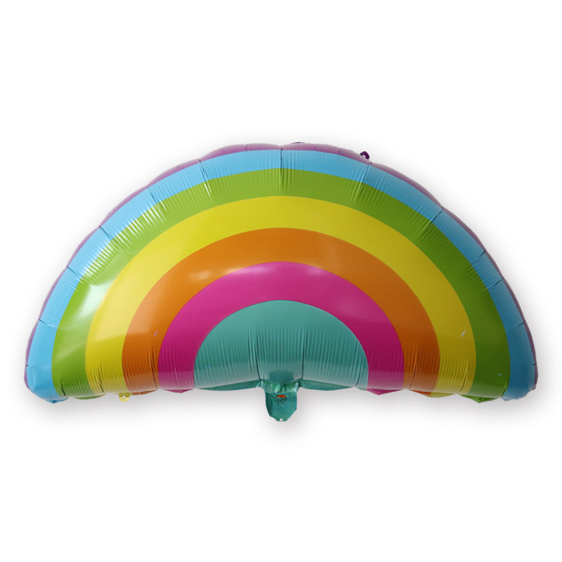 Cartoon foil balloon vibrant candy colored rainbow arch