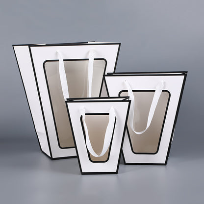 Trapezoid flower bag white finish with black border frame